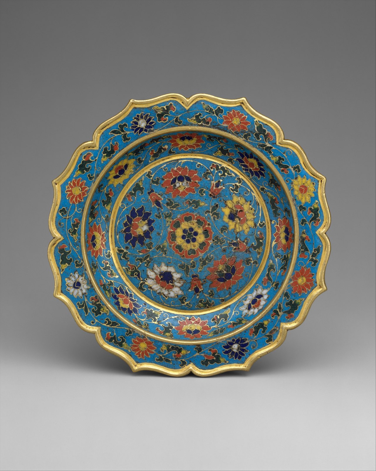 Scalloped cloisonné dish with multicoloured flowers on a turquoise ground
