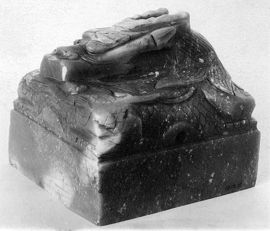A Ming dynasty gray-jade seal turns identity and authority into a physical mark.
