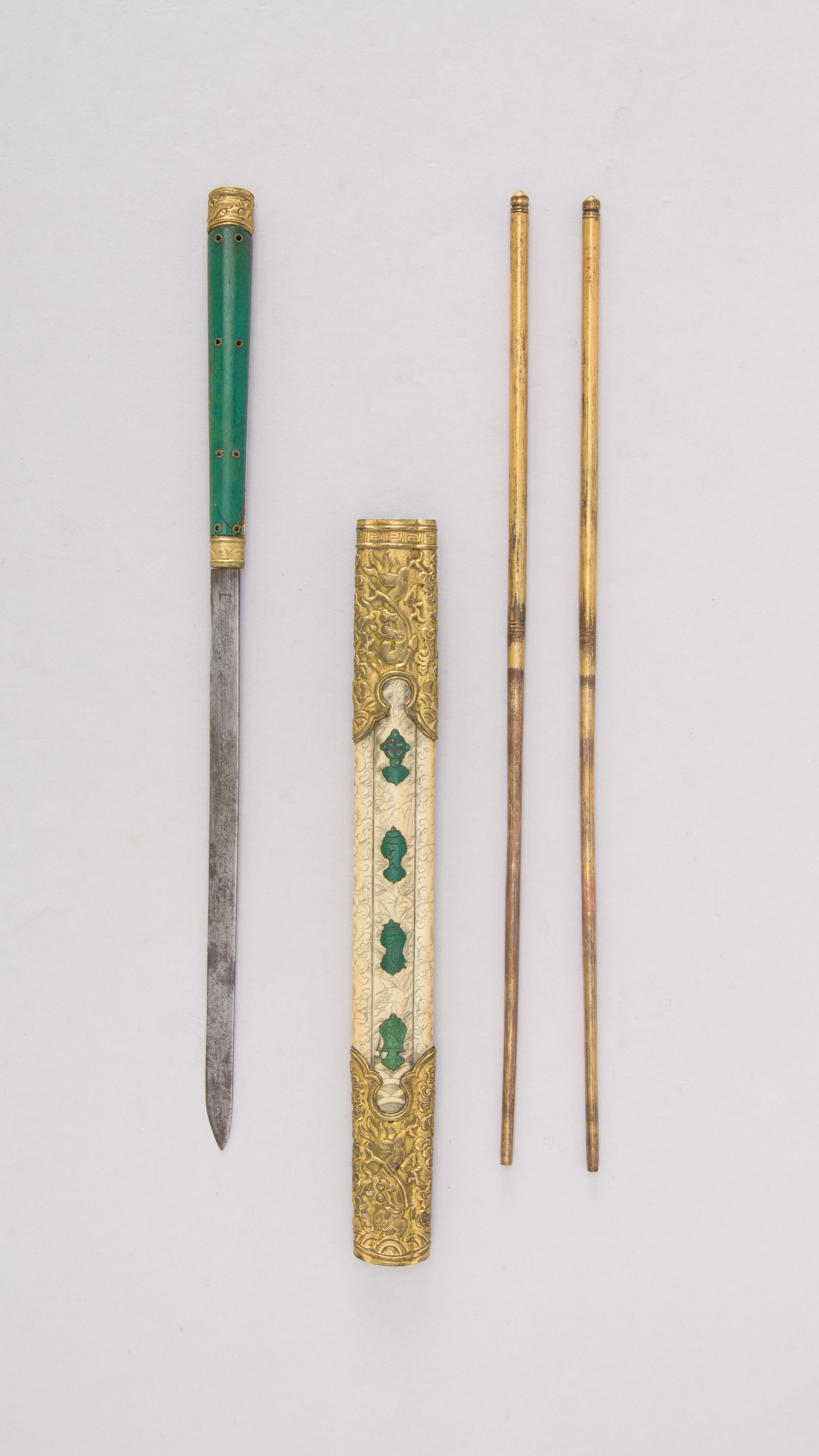 An eighteenth- or nineteenth-century portable set pairs chopsticks with a knife and earspoon.