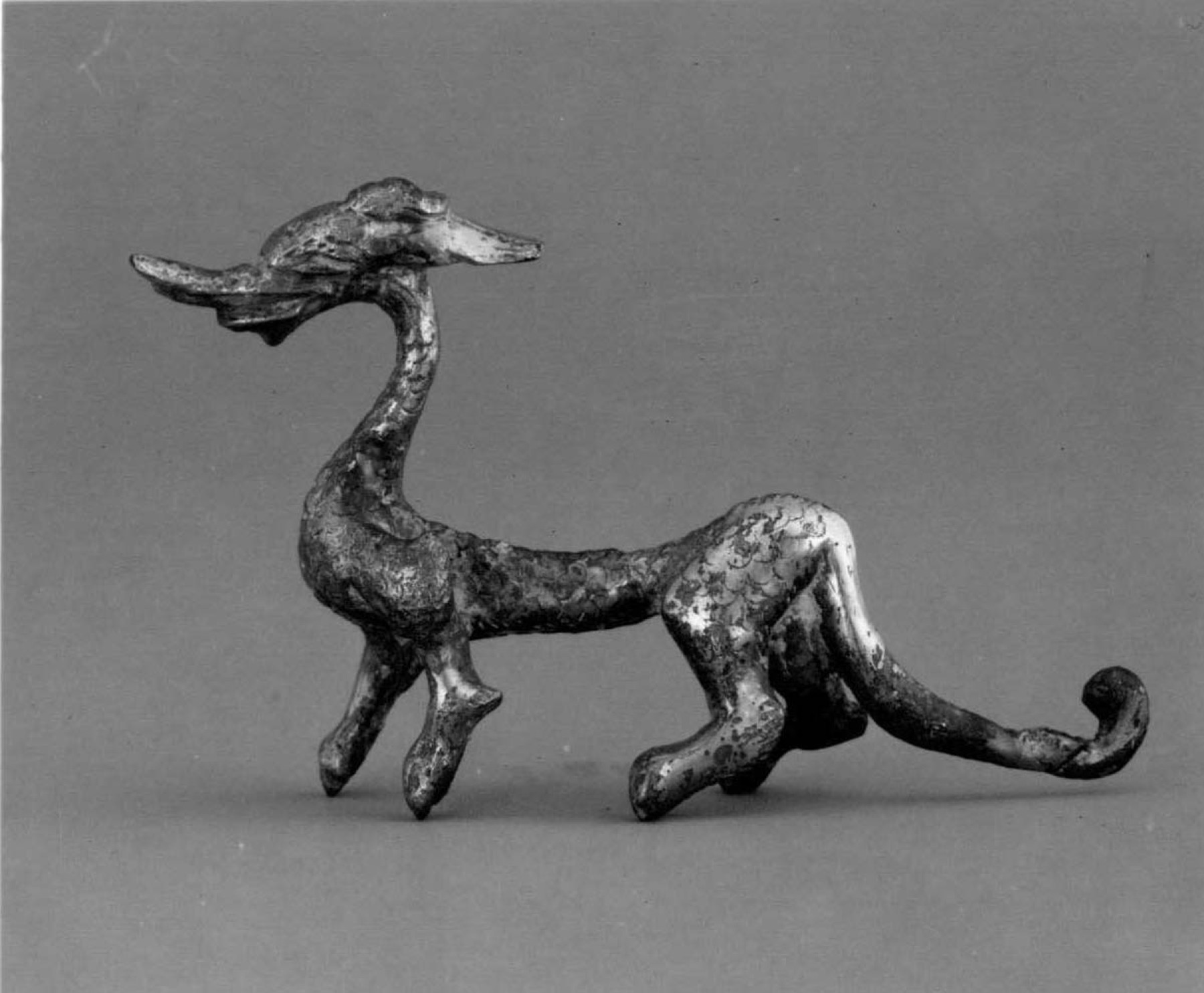 A compact seventh-century dragon demonstrates how the creature appeared in early decorative arts.