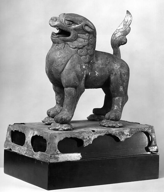 A Tang bronze lion shows the guardian form in a smaller material translation.