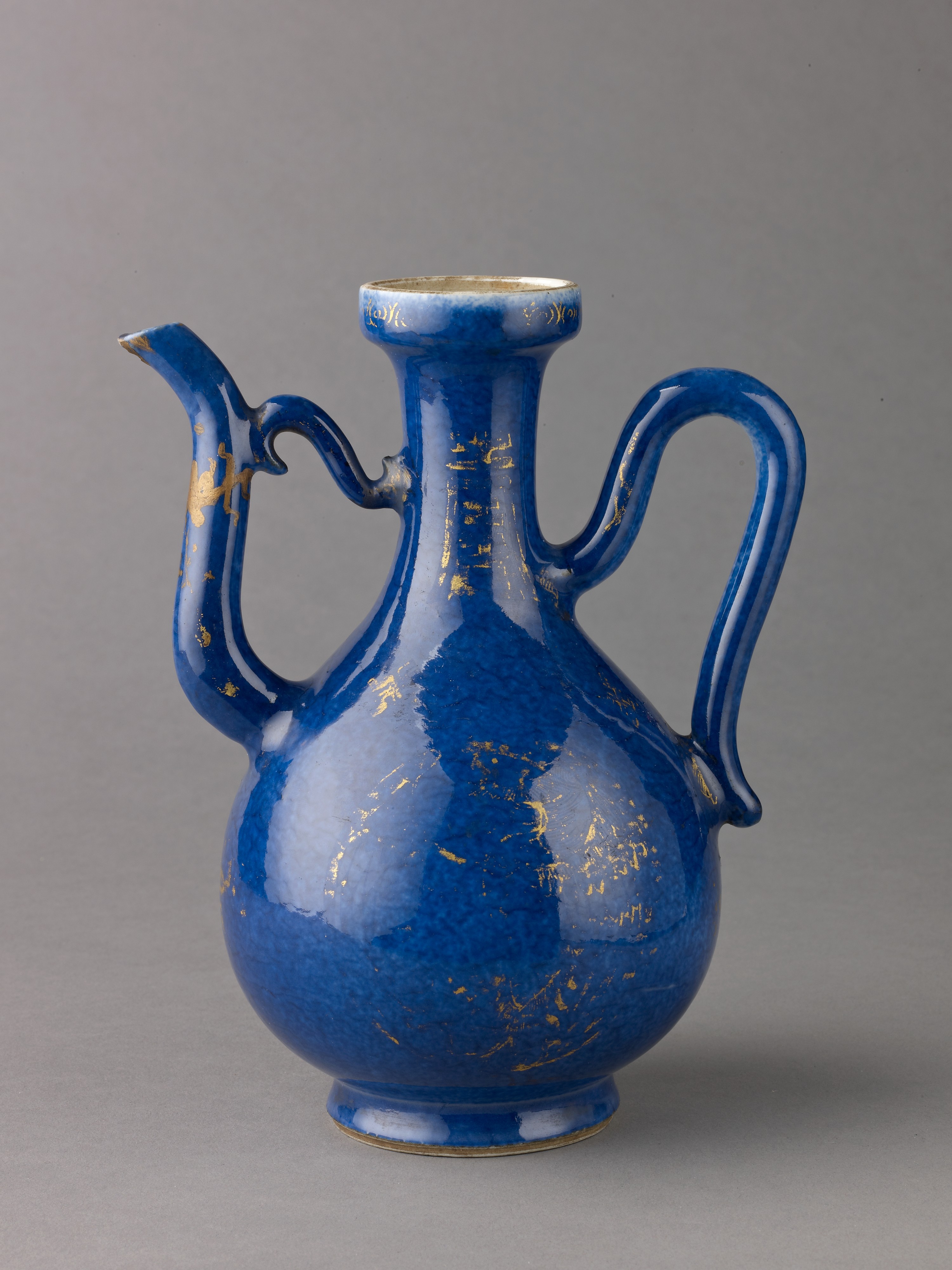 Powder-blue Qing porcelain ewer made for pouring water at the table.