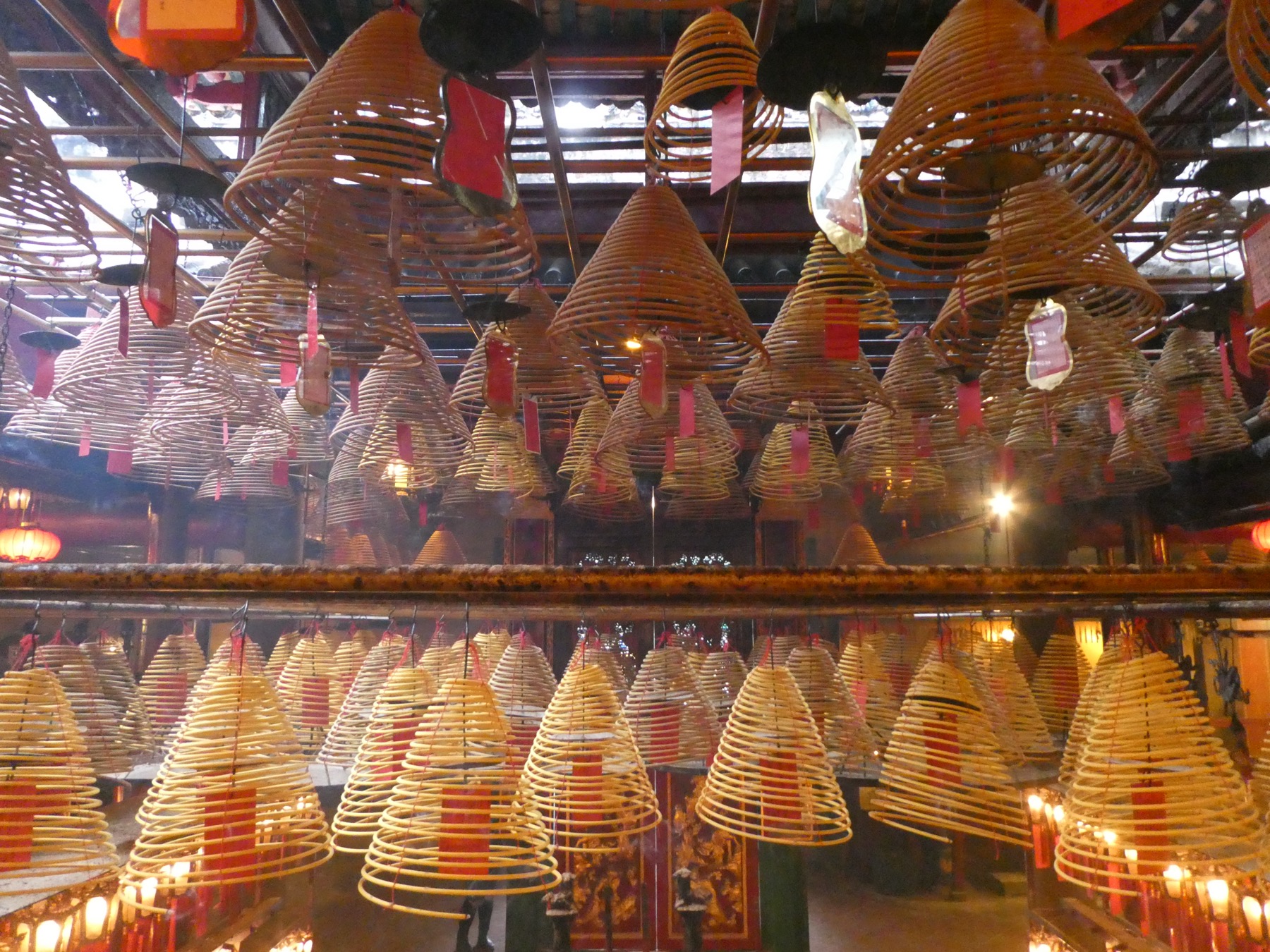 Incense coils burn beneath the ceiling of Man Mo Temple in Hong Kong.