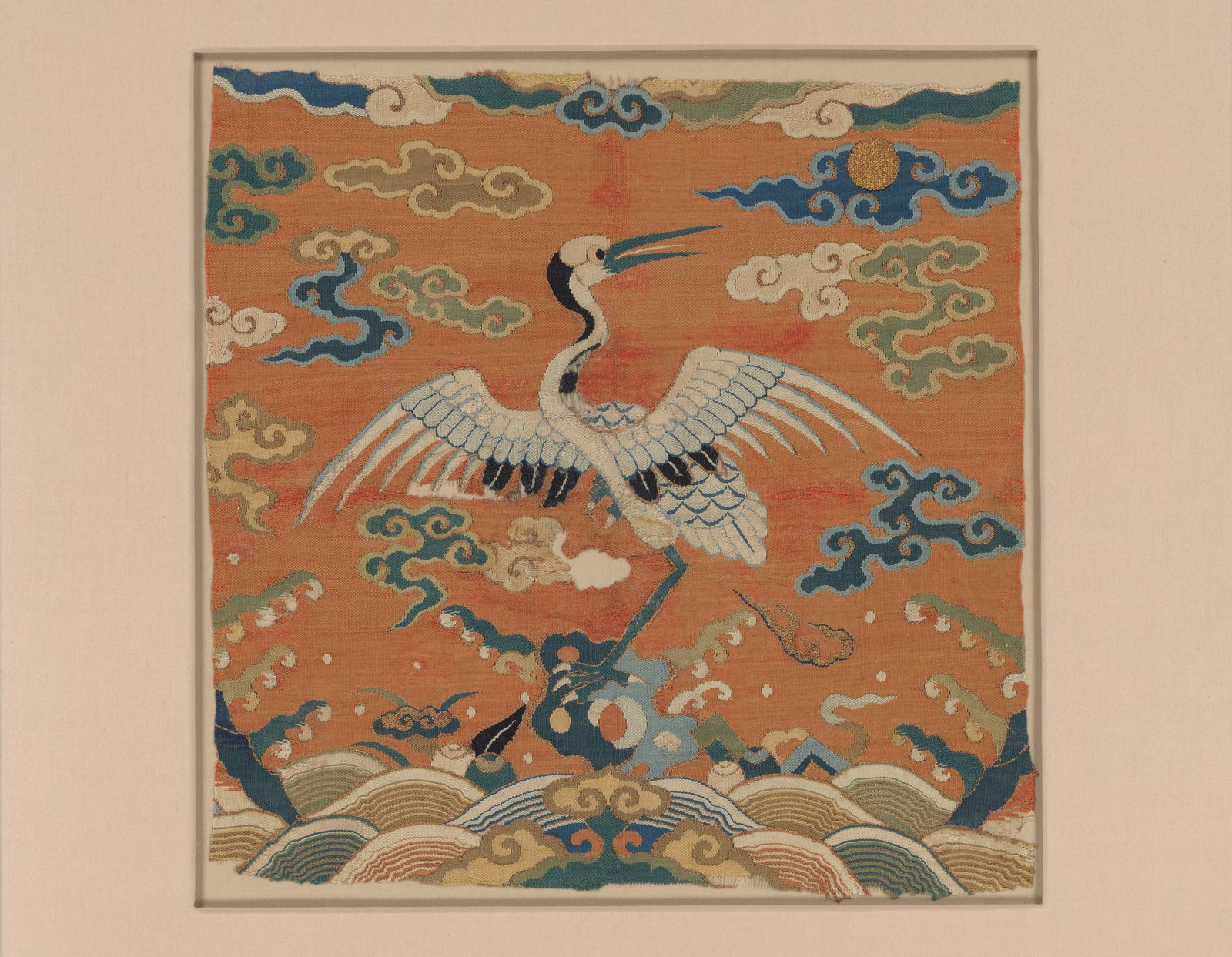Silk tapestry rank badge showing a crane.