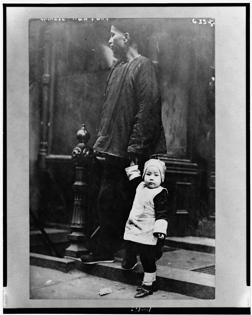 A 1909 photograph records a Chinese New Year gathering in New York.