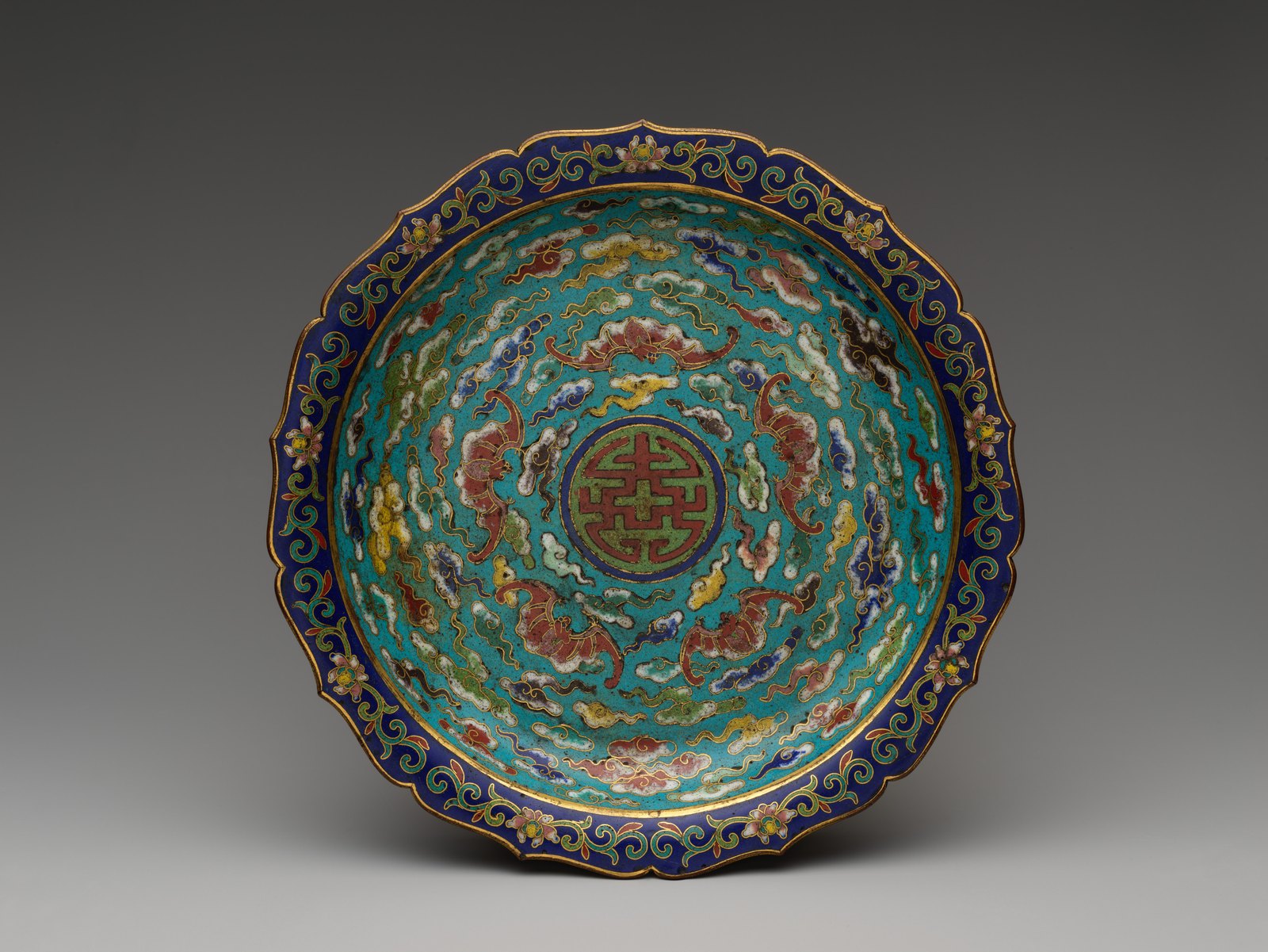 Lobed cloisonné enamel dish decorated with bats and clouds