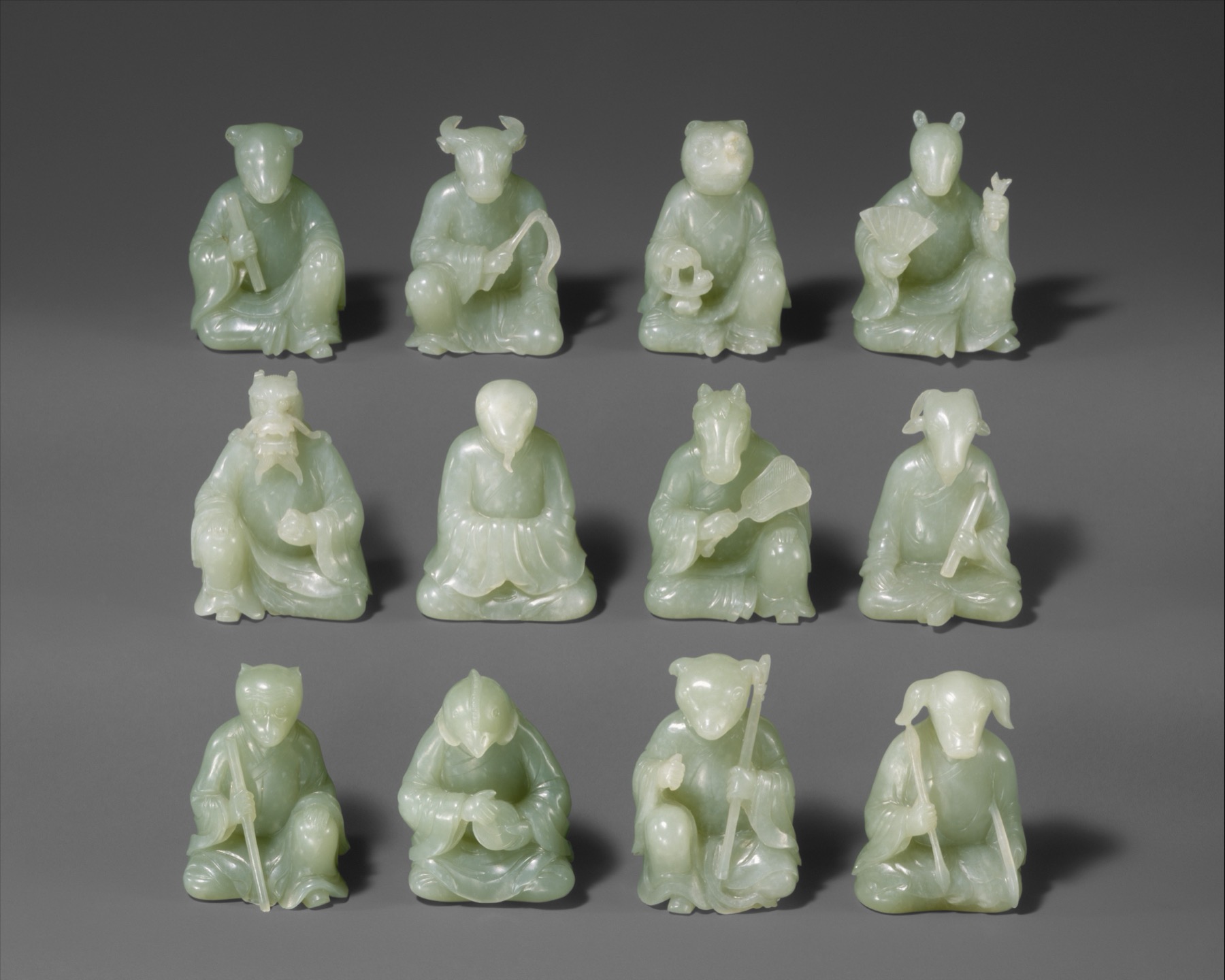 A Qing jade carving gathers all twelve zodiac animals into a single sculptural ensemble.