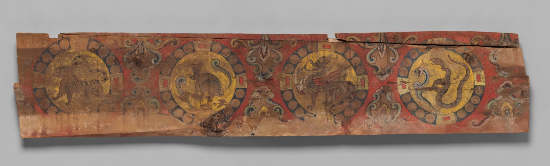 An eighth- or ninth-century panel arranges zodiac figures within a broader calendrical design.